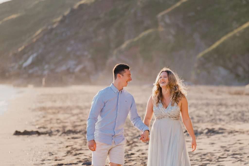 Cornwall Wedding Photography. A beautiful Engagement Shoot at sunset at Whitsand Bay, Cornwall