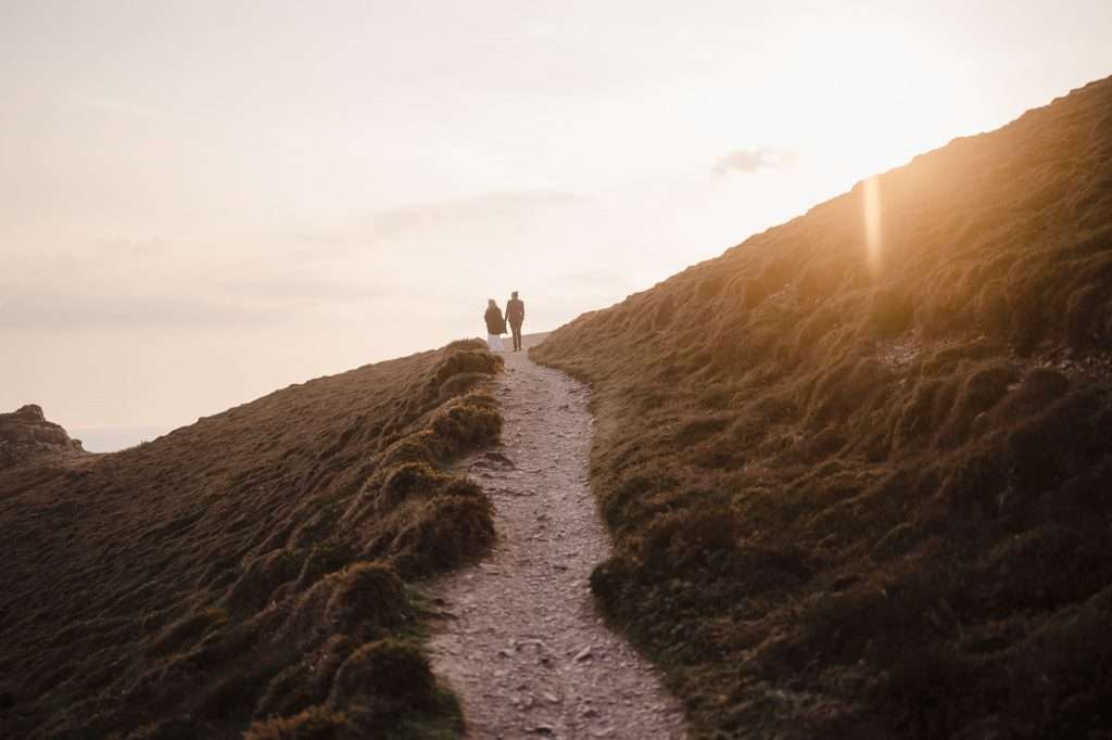 Walking off into the sunset as the couple enjoys their elopement wedding - 10 Ways to Have a More Sustainable and Eco-Friendly Wedding