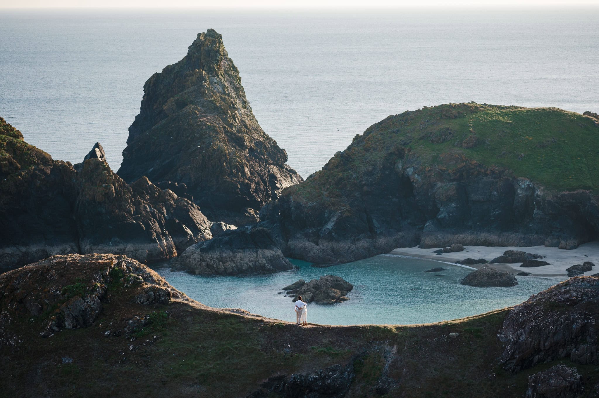 Couple on the spine at Kynance Cove - Best locations for an engagement photoshoot