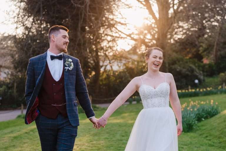 Happy Couple celebrating just getting married - 5 Wedding Planning Apps You Need