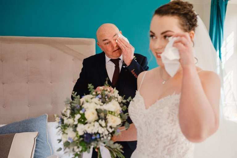 Emotional moment as the father sees the bride for the first time at The Alverton - My Wedding Planning Guide