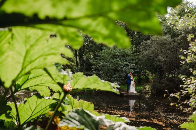 Wedding couple pose at Chycara, Cornwall - Your Cornwall Elopement Guide