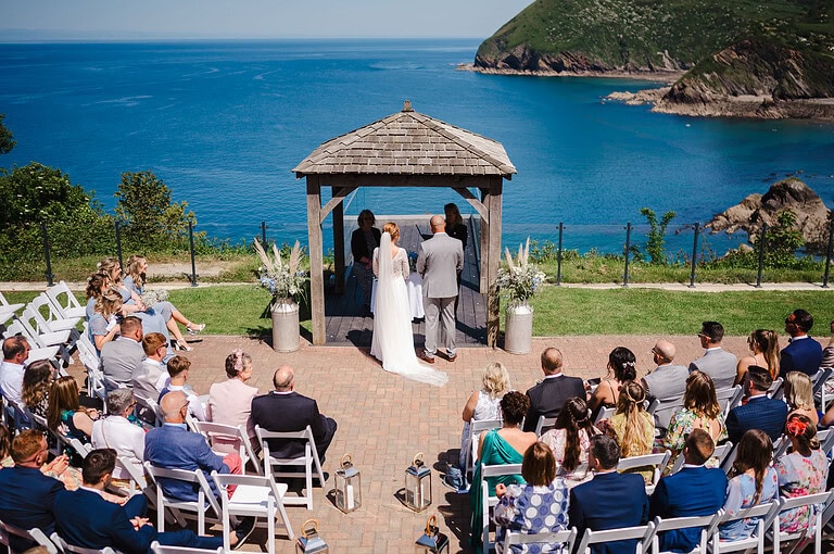 Wedding Ceremony Over looking the say at Sandy Cove Hotel, Devon