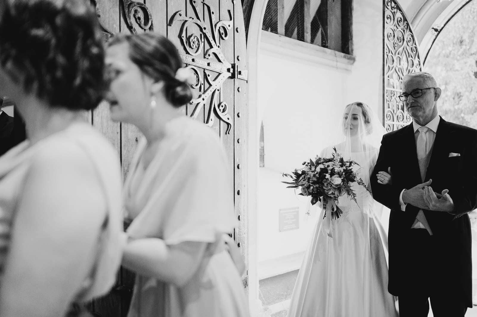 Bride and Father enter the church for the wedding ceremony - 3 Amazing Reasons Why You Should Think About Hiring a Wedding Planner