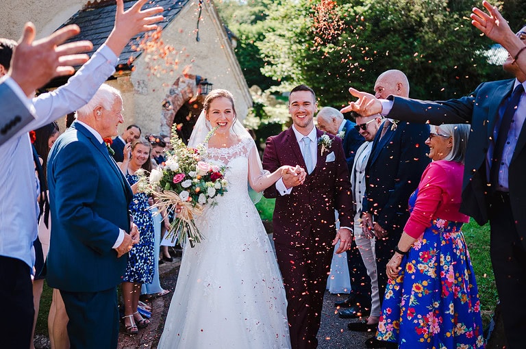 Wedding confetti outside a church in Exeter
