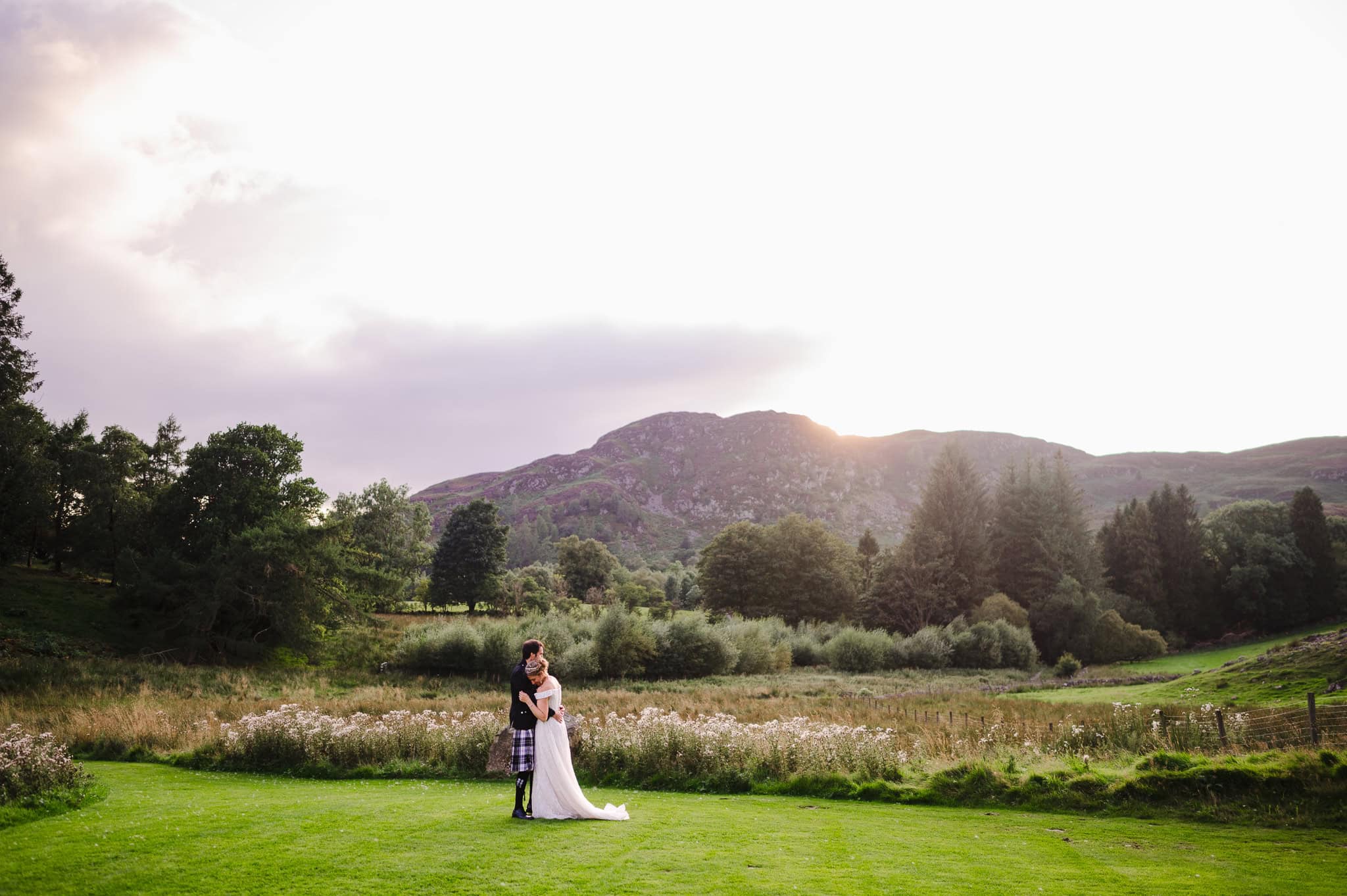 Couple portraits in Scotland with the mountains in the background