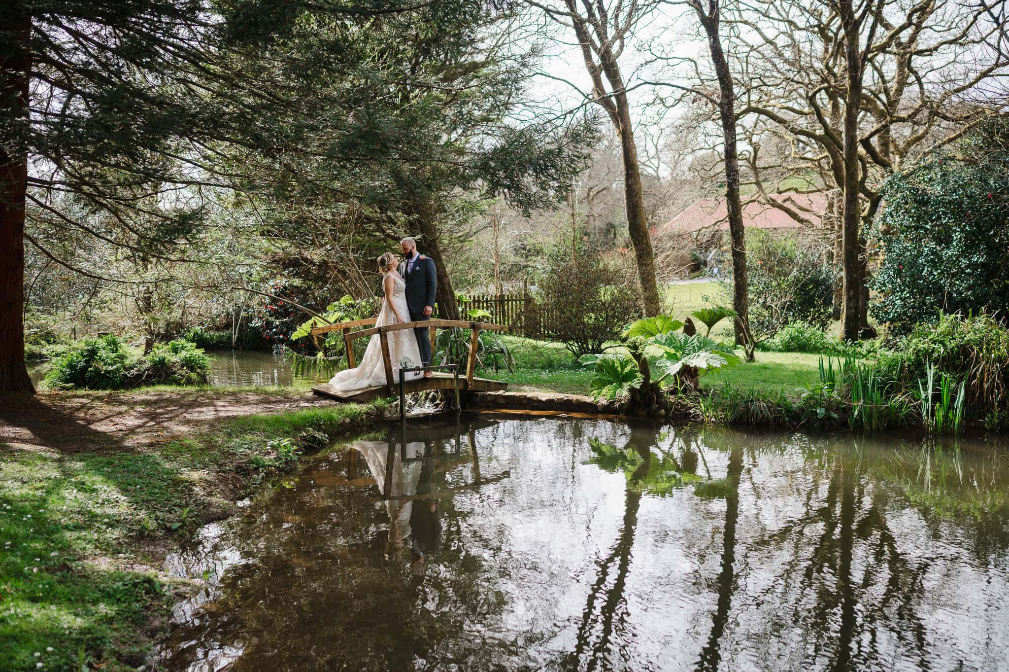 Wedding Couple standing on the waterfront at Chycara