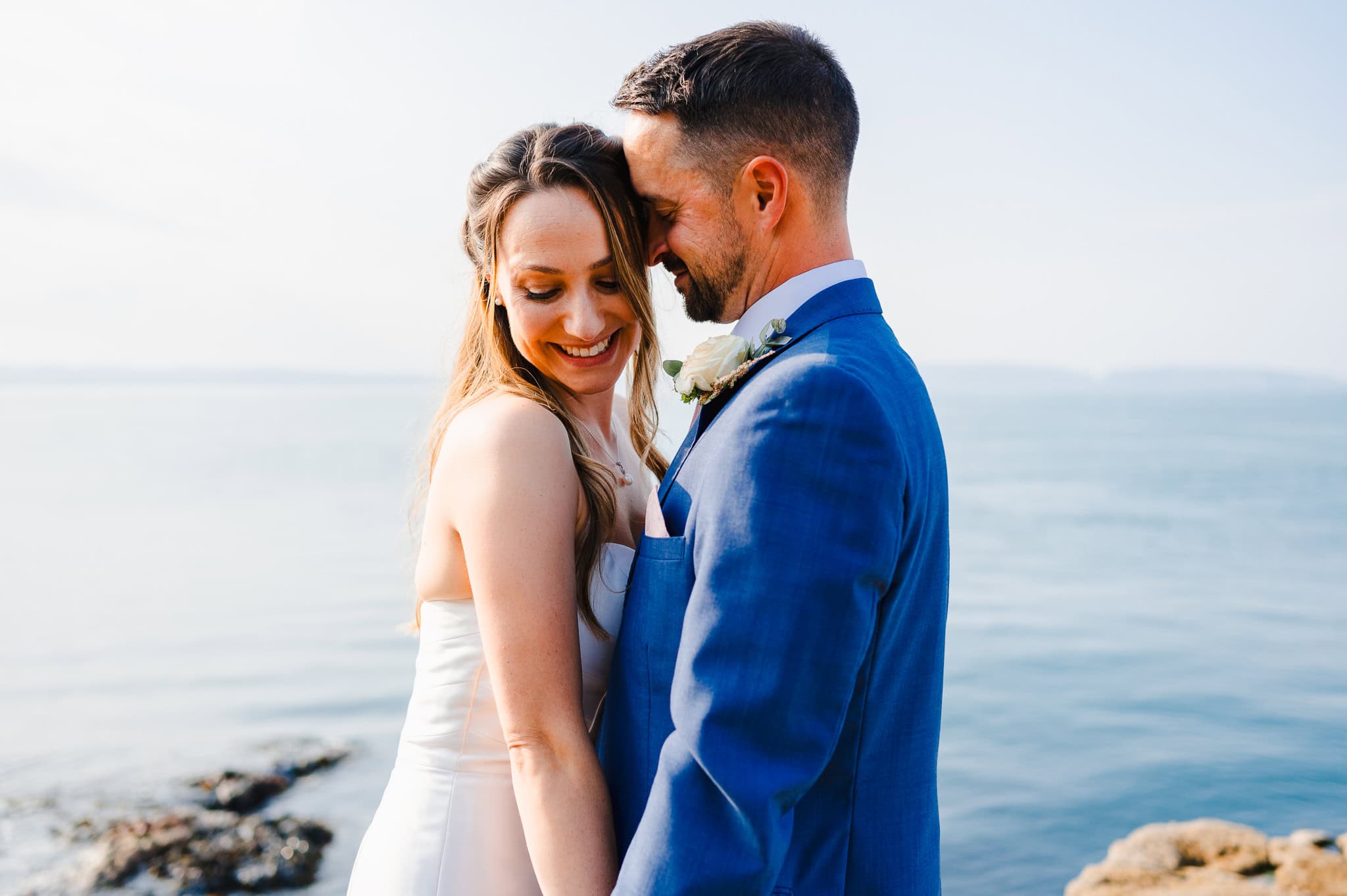 Couple up close during the sea view wedding in Devon