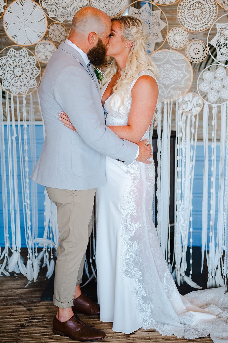 Bride and Groom share their first kiss as husband and wife
