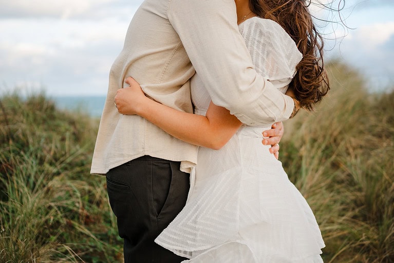 Up close as the happy couple put their arms around each other