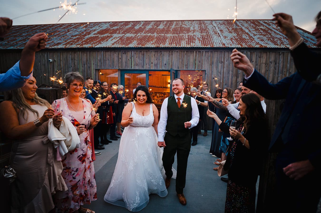 Walkiong down the sparkler aisle at Avalen by Cornwall Wedding Photographer Jake Timms Photographer - Home Page