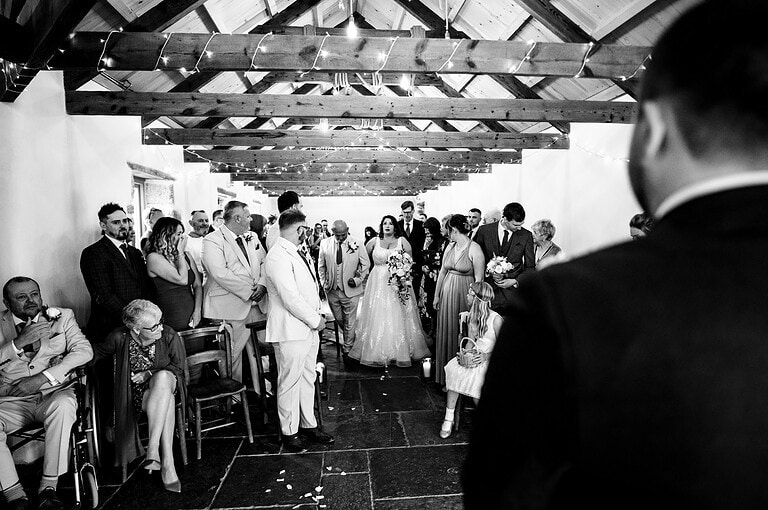Bride and father walking down the aisle