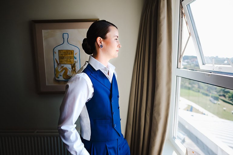 Bride looking out the window