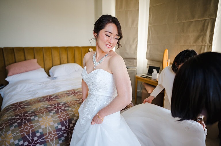 Bride enjoying her large white dress