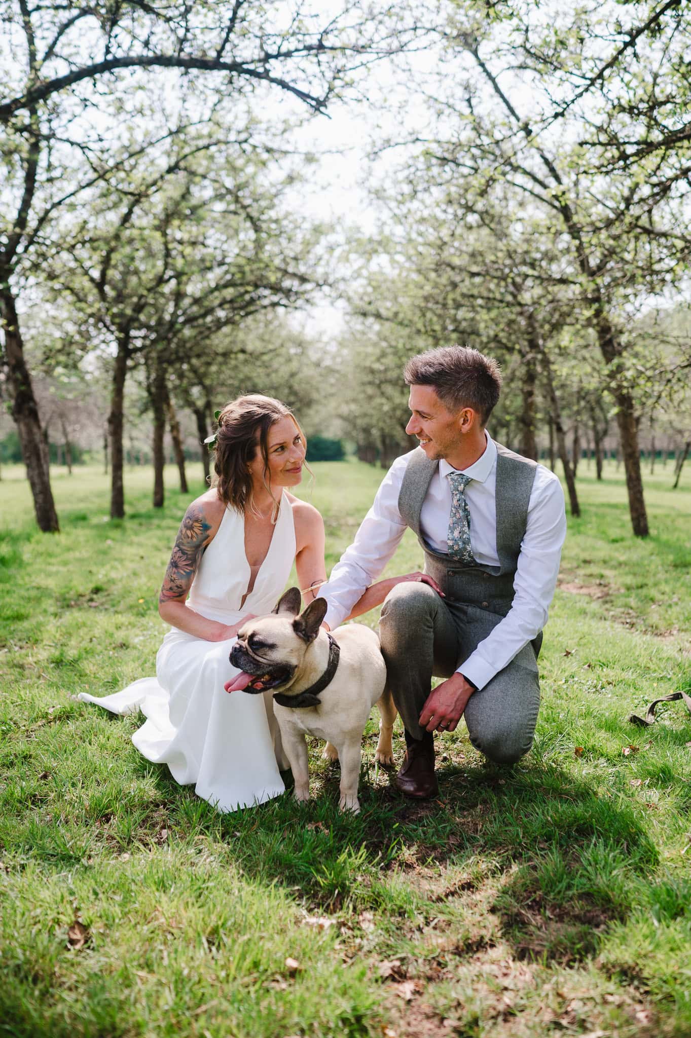 Newlyweds pose with their dog at Froginwell Vineyard by Devon Wedding Photographer Jake Timms Photography