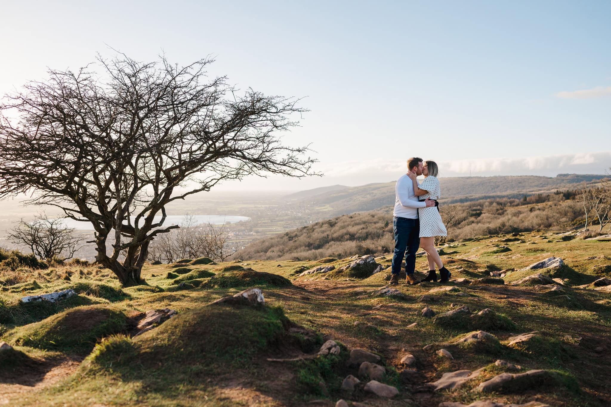 The bare windswept trees on top of Cheddar gorge make for quite a sight and the perfect little detail to pose next to during your Cheddar Gorge engagement photo shoot by Somerset Engagement Photographer, Jake Timms Photography