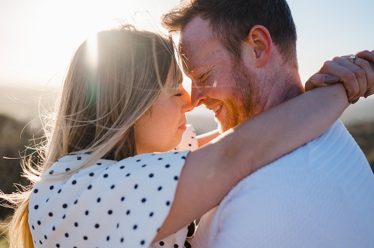 The magazine kiss, or the moment before. All smiles as the happy couple enjoy beautiful intimate engagement photos
