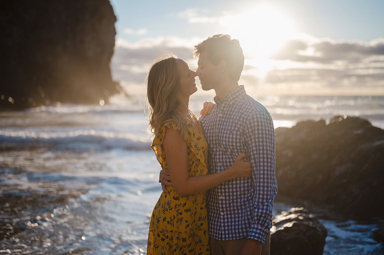 Silhouette of the couple before they kiss on the beach at Wheal Coates, Cornwall. By Cornwall Engagement Photographer, Jake Timms Photography
