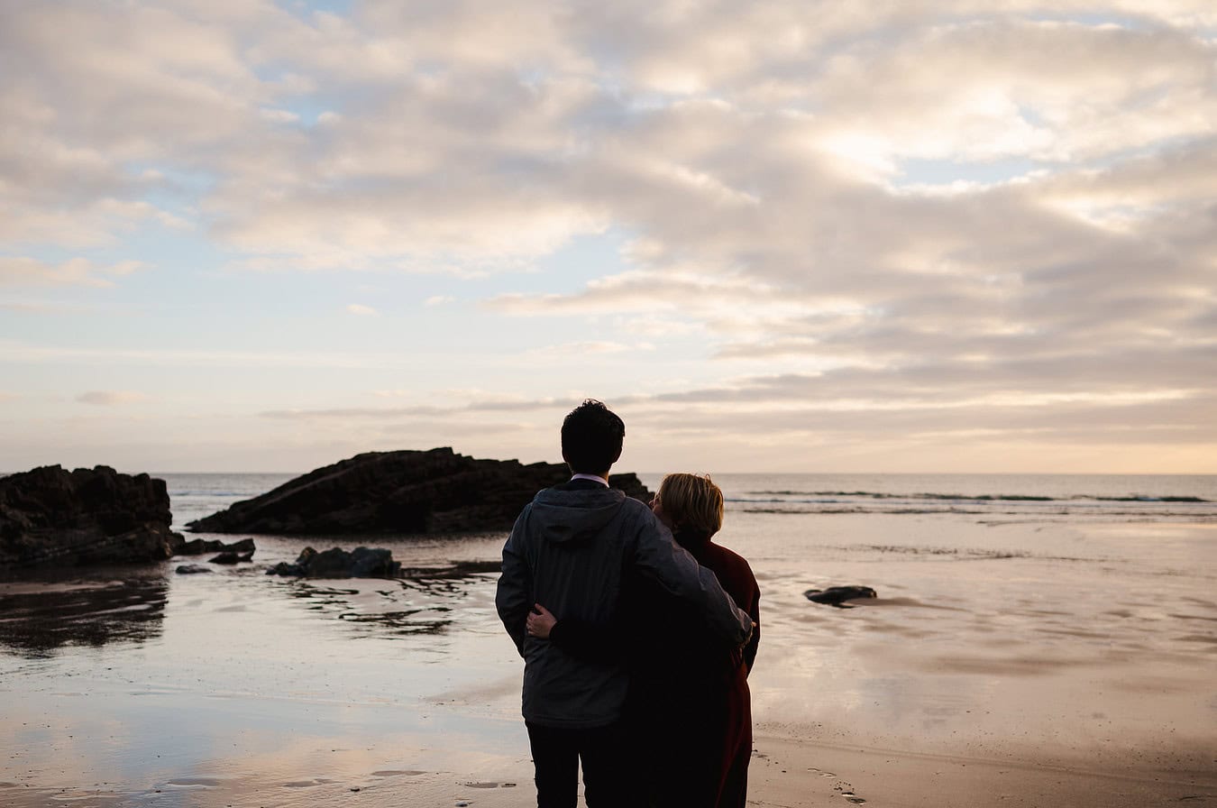 What a beautiful view. Looking out to sea watching the sunset is one of the most beautfiul things to see. A perfect icing on the cake to their engagement photos. By Cornwall engagement photographer, Jake Timms Photography