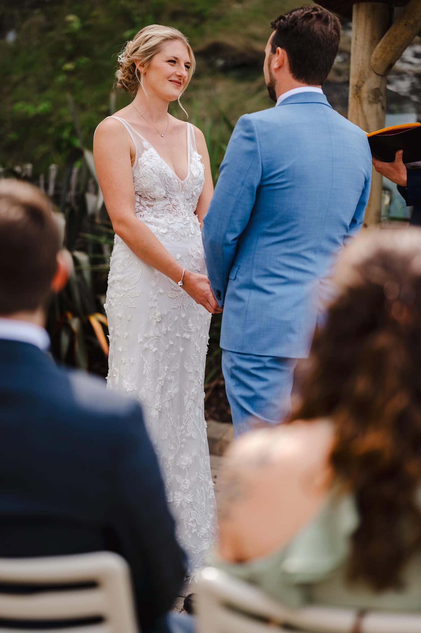 Wedding couple at the end of the aisle celebrating getting married in Devon by Exeter wedding photographer Jake Timms Photography