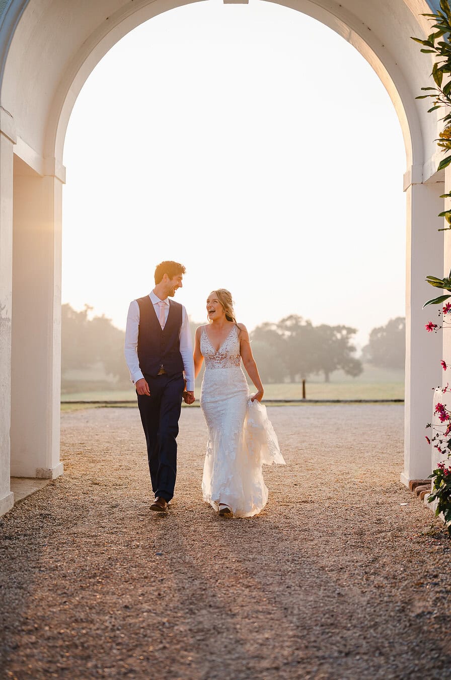Walking through the golden archway at Rockbeare Manor