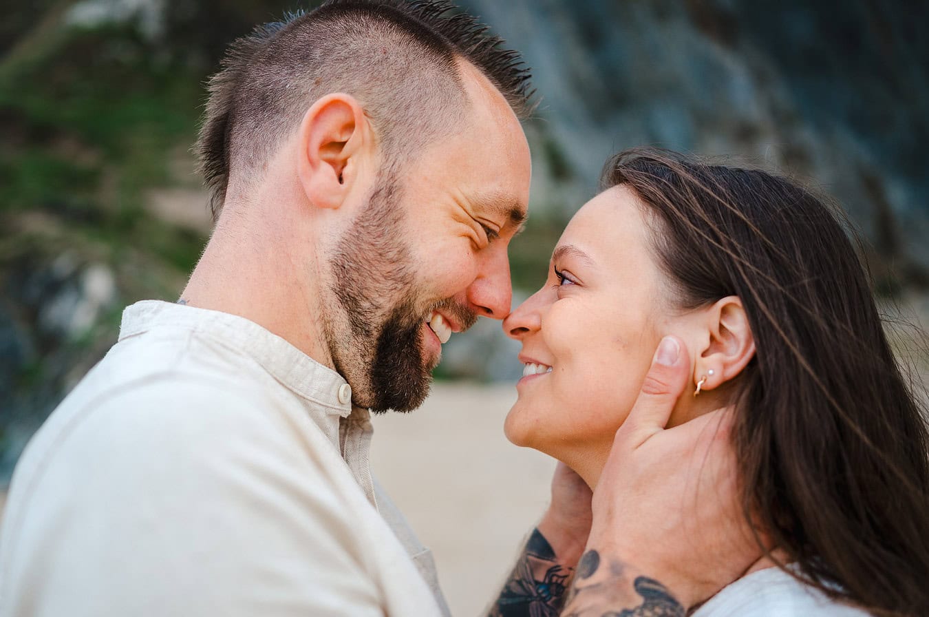 Smiling as the happy couple look into each others eyes