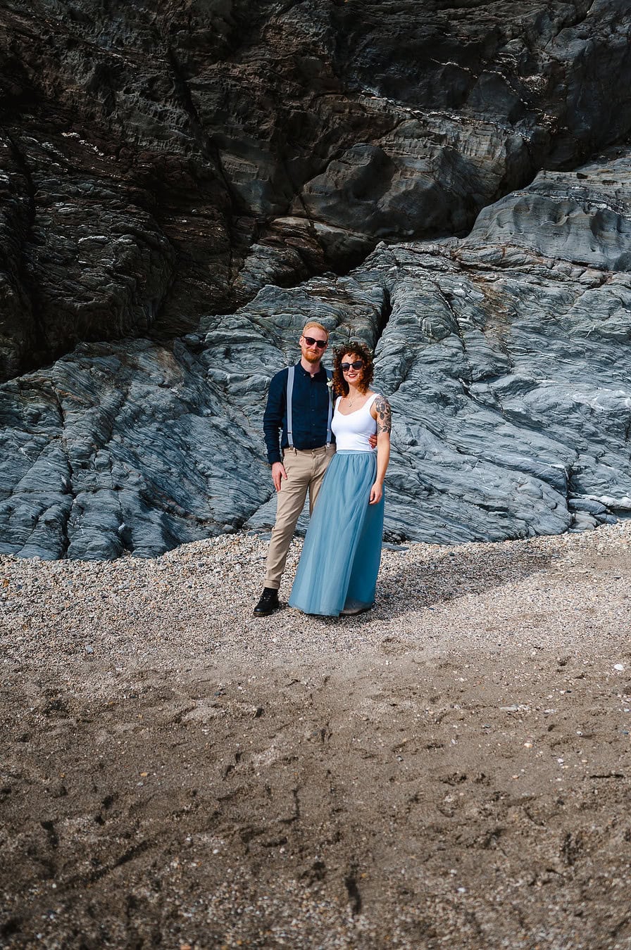 When in doubt put your sunglasses on and strike a couples pose against the slate cliffs of Cornwall