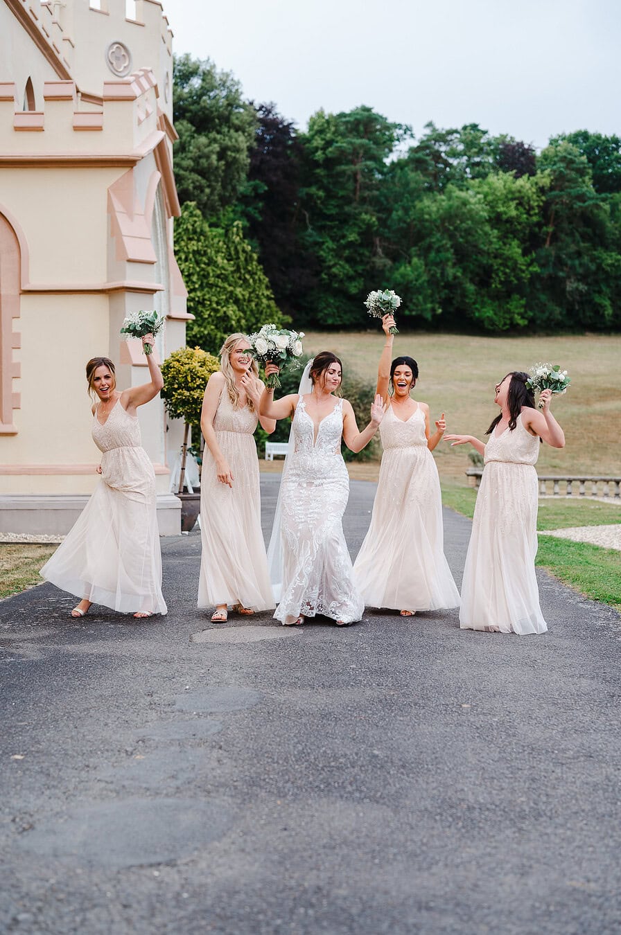 Bridal party happiness as they all take a pose – Wedding Portfolio
