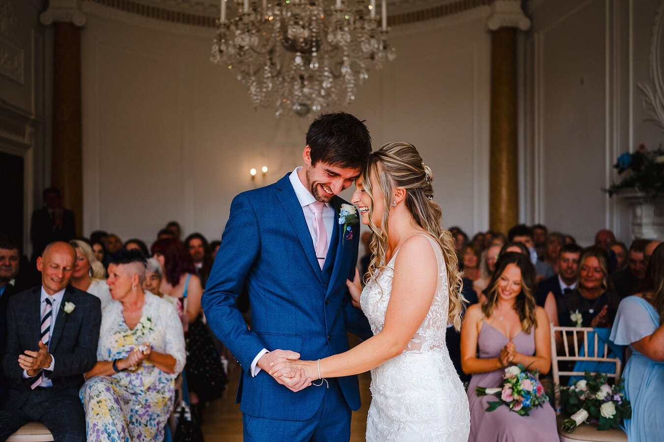 Bride and groom share lots of laughter as they are announced husband and wife