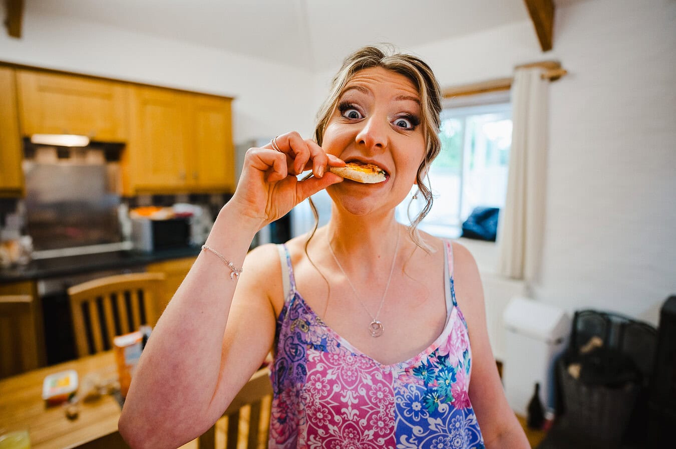 Weddings are made for goofy photos and eating pizza - The Best Of Wedding Photography 2024