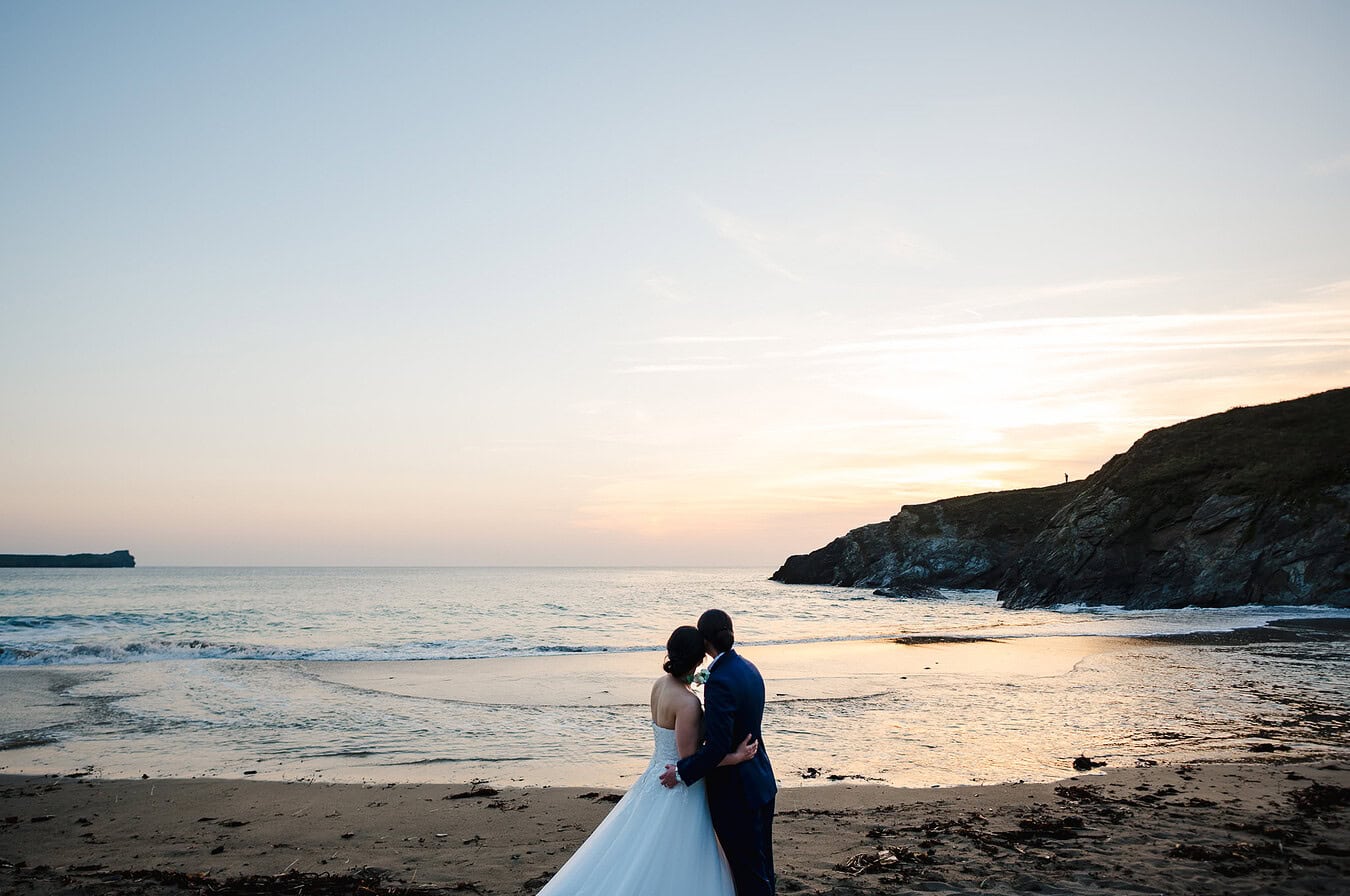 Watching the sunset as a just married couple