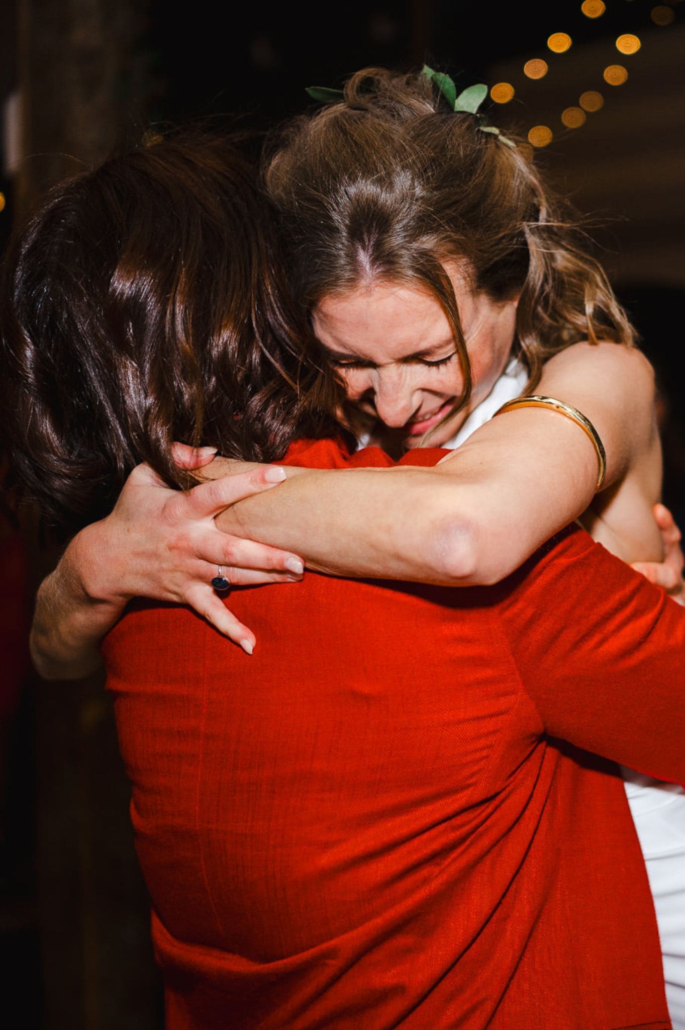 The bride hugs one of her best friends on her wedding day as the emotions of her wedding run wild by Cheshire Wedding Photographer, Jake Timms Photography