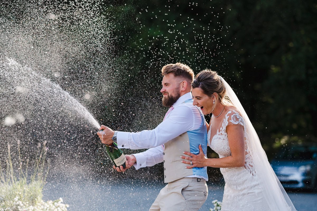 Pop the champagne to celebrate getting married by Cheshire Wedding Photographer - Jake Timms Photography