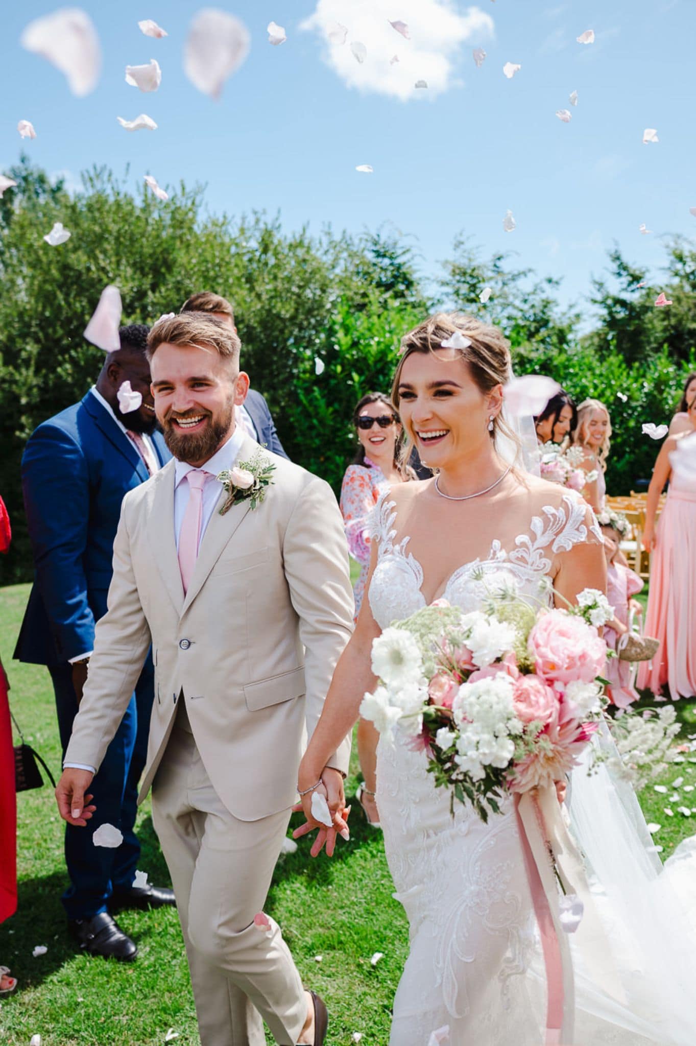 The Bride and Groom walk down the confetti line by Cheshire Wedding Photographer - Jake Timms Photography