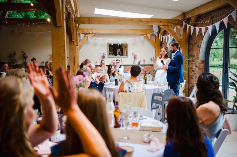 The bride and groom give a wedding speech at Froginwell