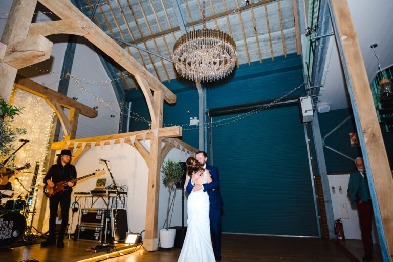 First dance under the chandelier at Froginwell Wedding Venue