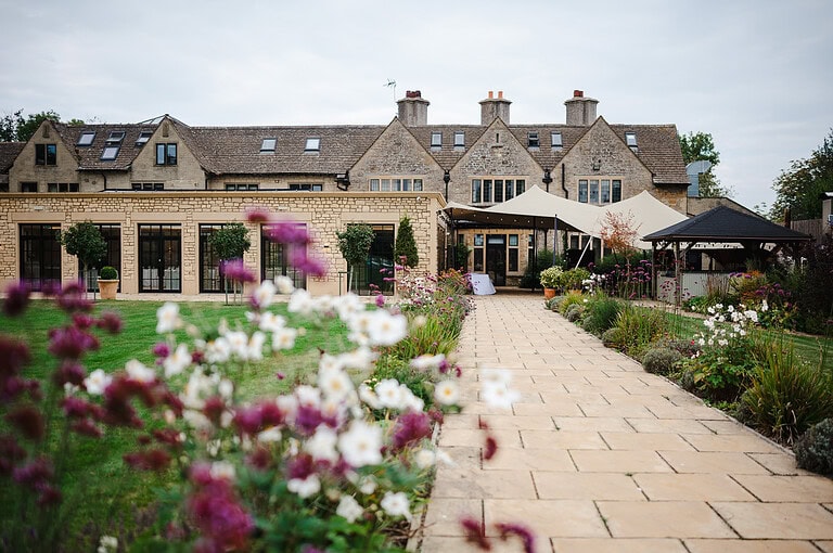 Looking from the ceremony area at The Pear Tree Purton wedding venue - By Jake Timms Photography